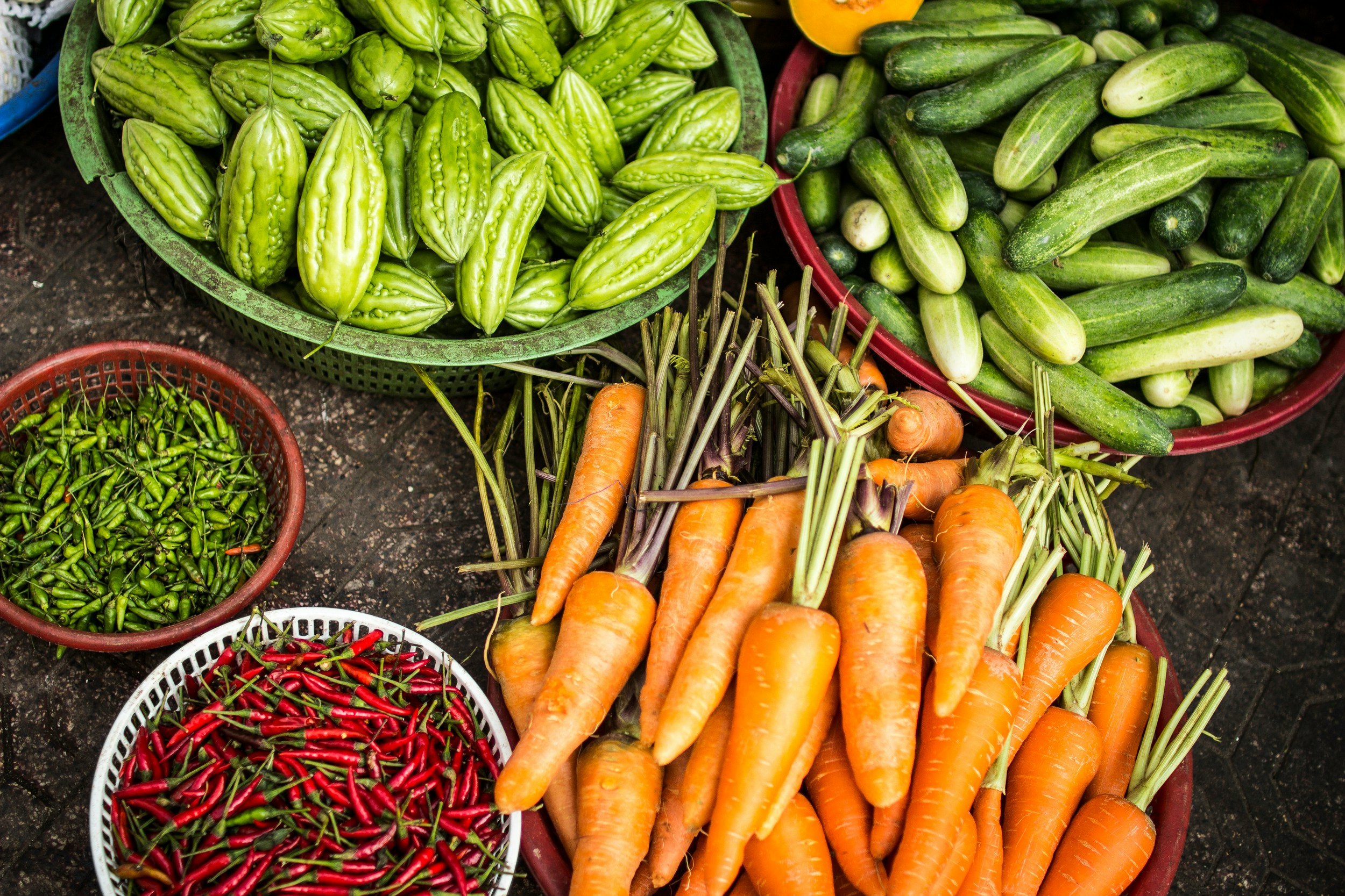 A close up of farm produce in various bowls